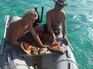 Two conch, two trigger fish, a grouper and a porgy.